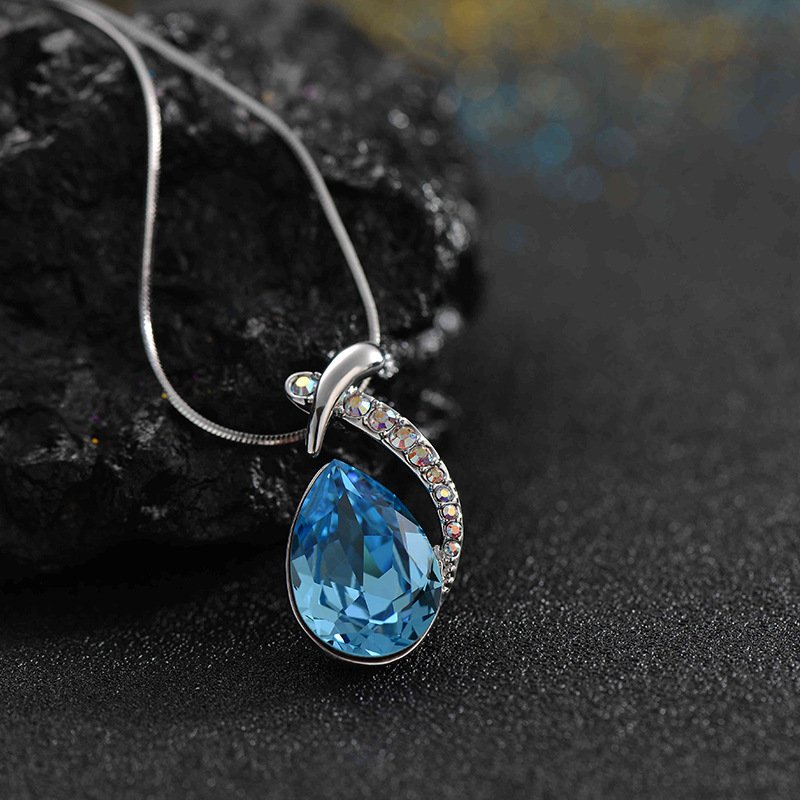 the diamond studded crystal pendant necklace features an austrian crystal mermaid fish necklace the diamond studded crystal pendant necklace features an austrian crystal mermaid fish necklace