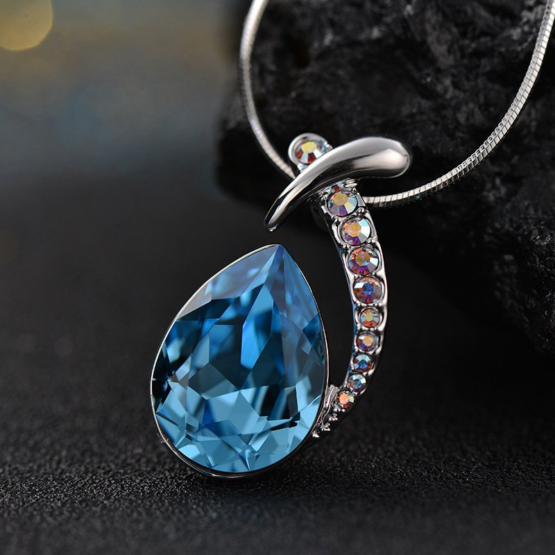 the diamond studded crystal pendant necklace features an austrian crystal mermaid fish necklace the diamond studded crystal pendant necklace features an austrian crystal mermaid fish necklace