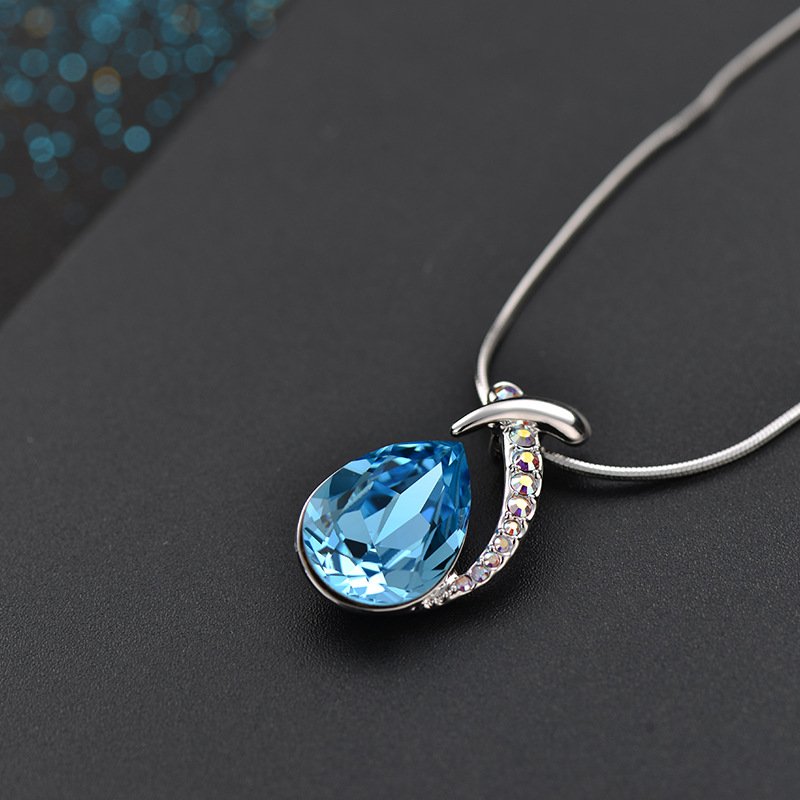 the diamond studded crystal pendant necklace features an austrian crystal mermaid fish necklace the diamond studded crystal pendant necklace features an austrian crystal mermaid fish necklace