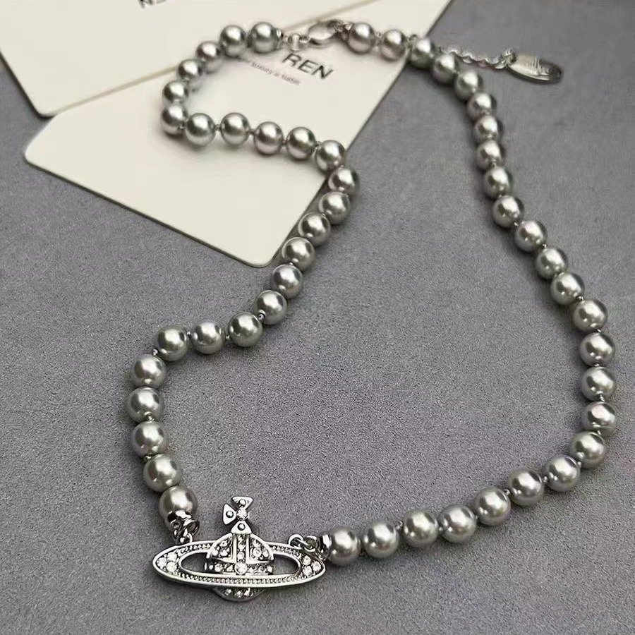 saturn grey pearl necklace and bracelet saturn grey pearl necklace and bracelet