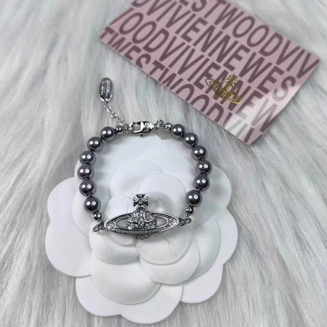 saturn grey pearl necklace and bracelet saturn grey pearl necklace and bracelet