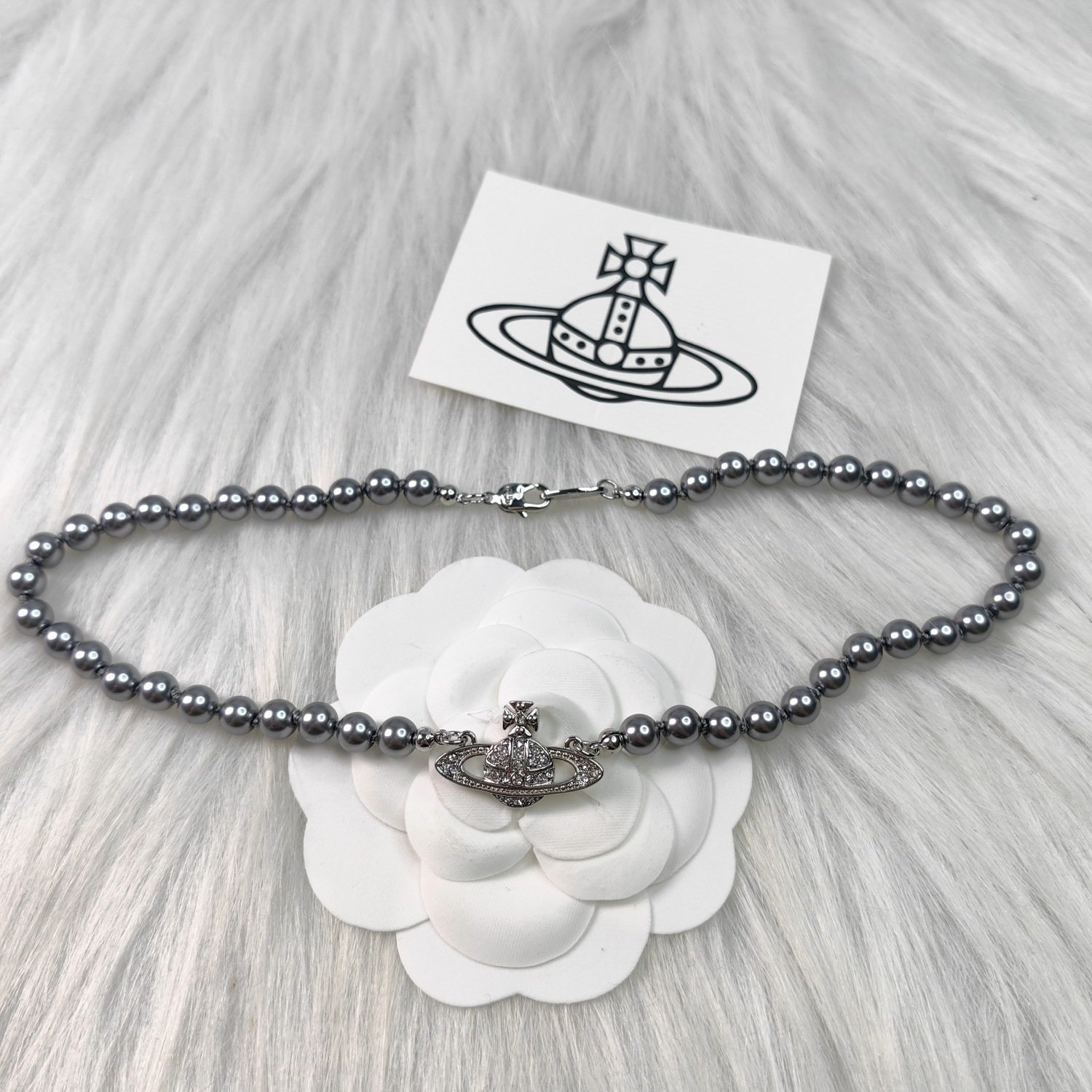 saturn grey pearl necklace and bracelet saturn grey pearl necklace and bracelet