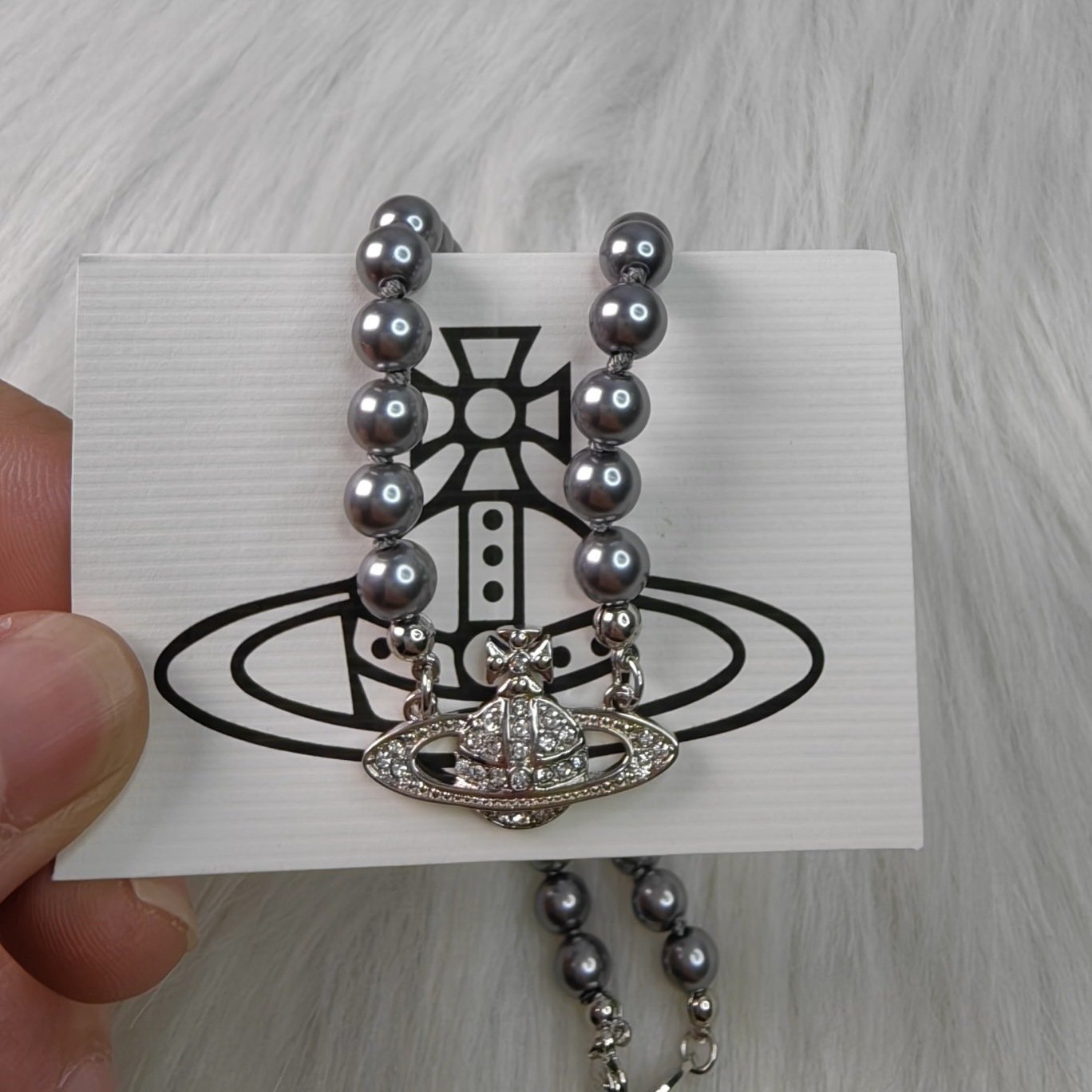 saturn grey pearl necklace and bracelet saturn grey pearl necklace and bracelet