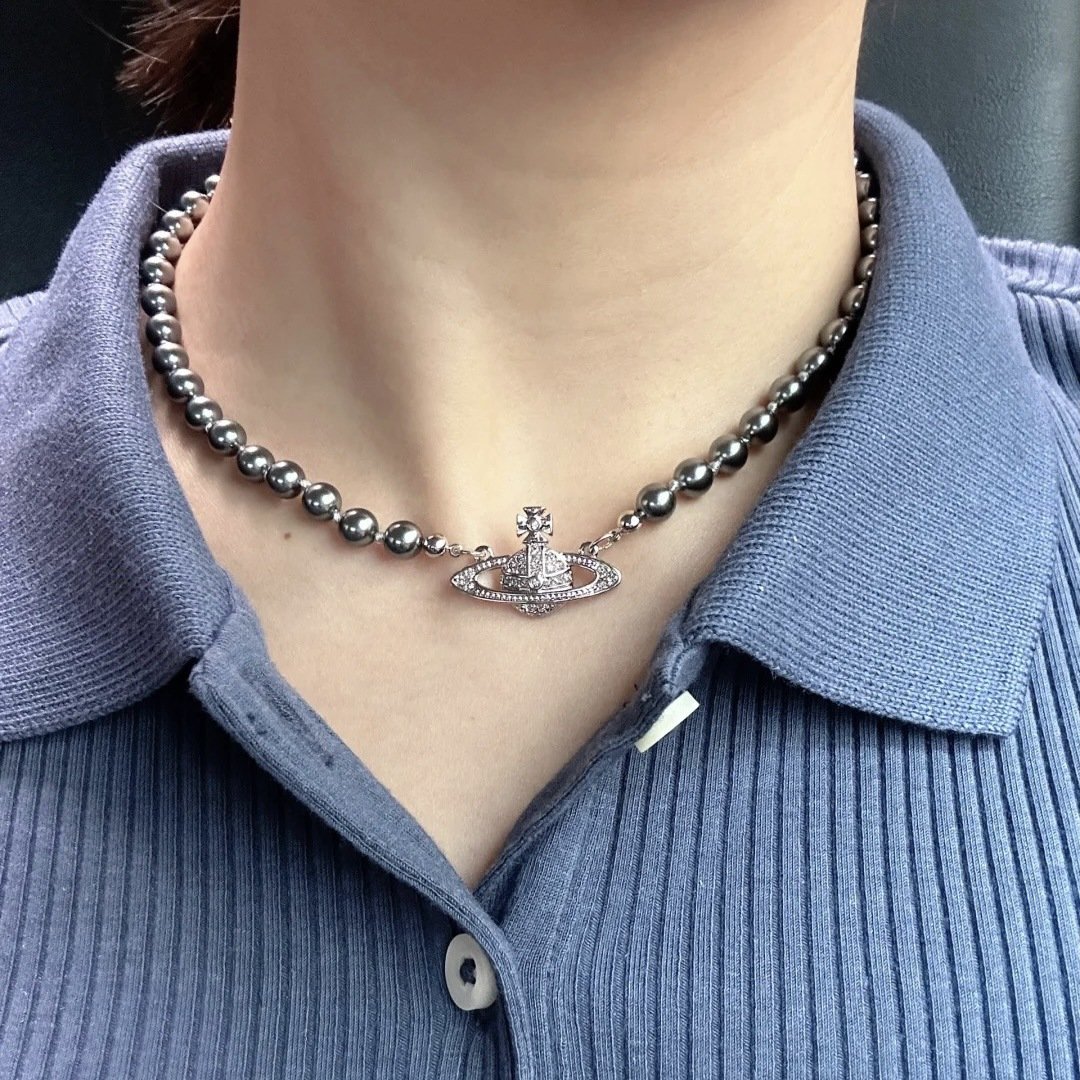 saturn grey pearl necklace and bracelet saturn grey pearl necklace and bracelet