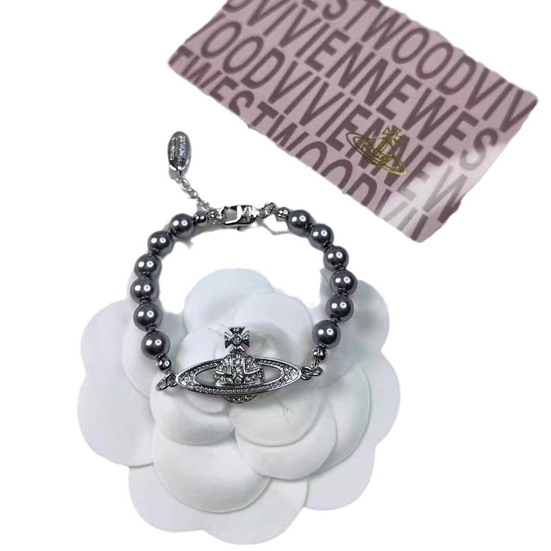 saturn grey pearl necklace and bracelet saturn grey pearl necklace and bracelet